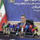 Behzad Akbari seated behind microphones at a press conference. Iran internet filtering