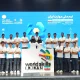 Members of Iran’s national skills team pose behind a WorldSkills Iran sign.
