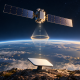Conceptual illustration of a communications satellite above Earth and a receiving terminal below.