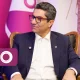 Mehdi Faghihi seated in front of a Rightel backdrop.